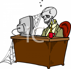 205_skeleton_at_a_dead_end_job_with_cob_webs_forming_on_it_and_the_computer_he_was_stuck_at